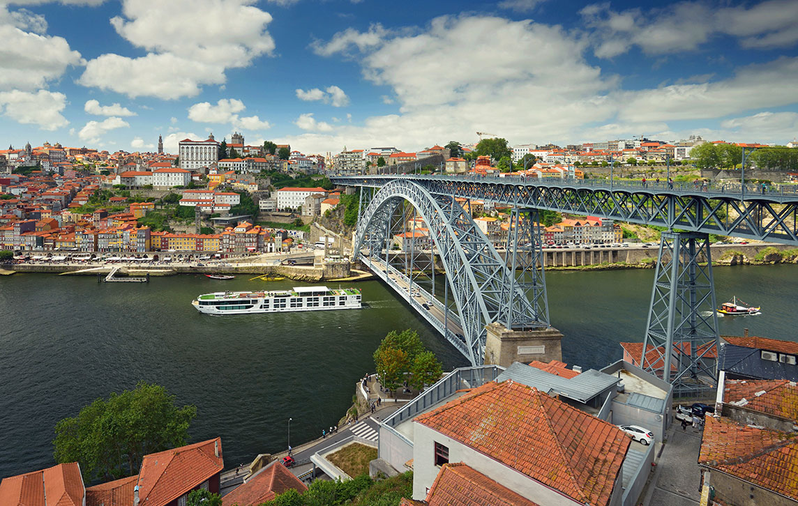 Scenic Azure cruising under the Dom Luis Bridge, Porto, Portugal