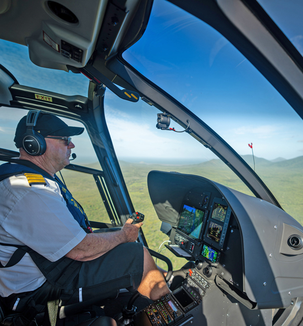 Helicopter flying over Cape York, Far North Queensland