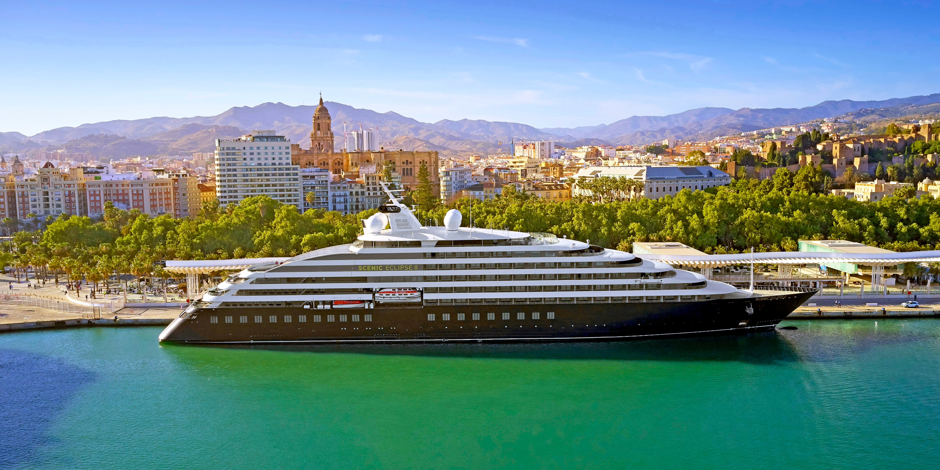 Scenic Eclipse docked in Malaga, Spain, one of the oldest ports in the Mediterranean and the gateway to the sparkling Costa del Sol.