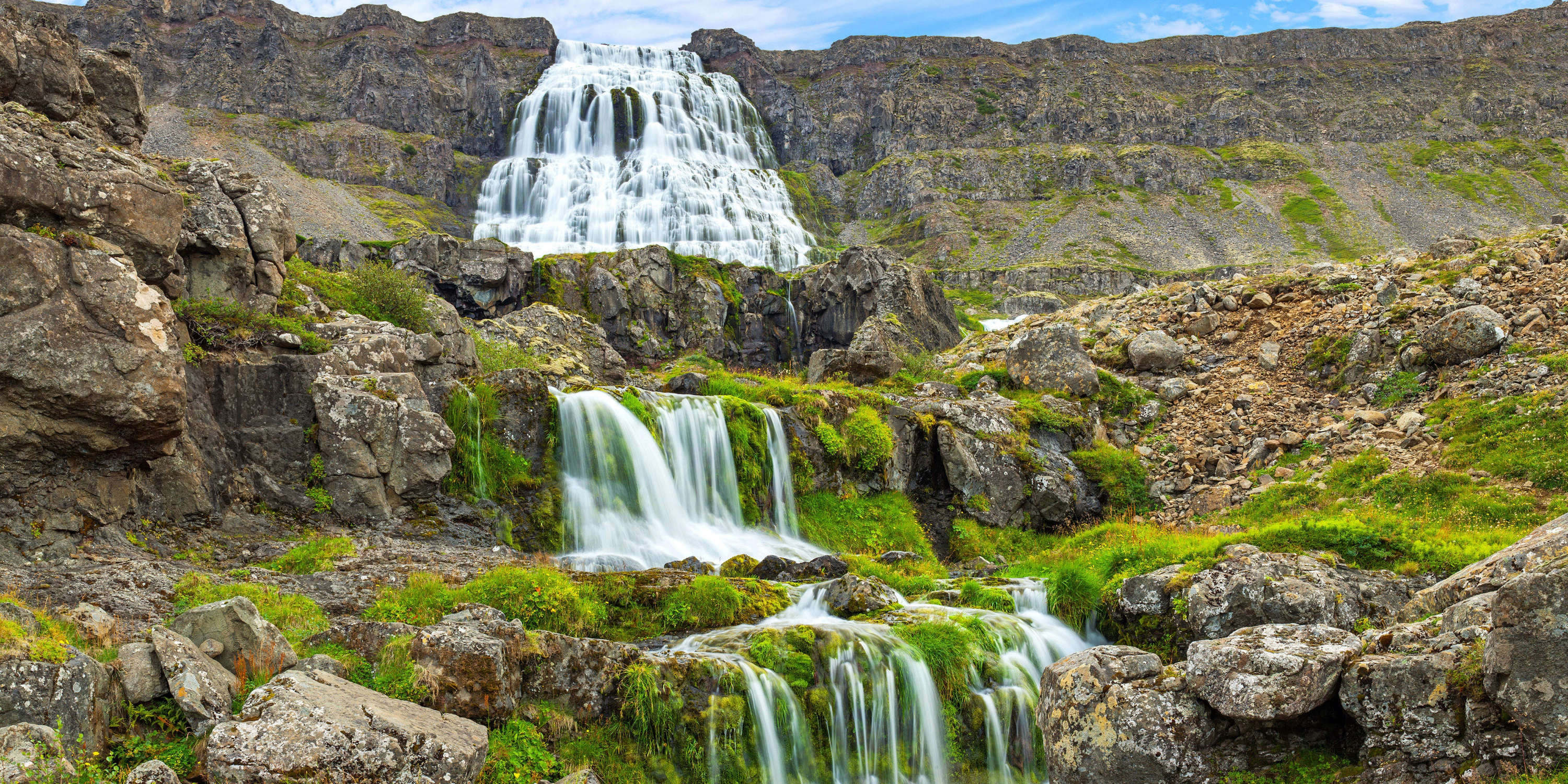 Admire the tumbling waters of Dynjandi, the largest waterfall in the Westfjords region of Iceland.