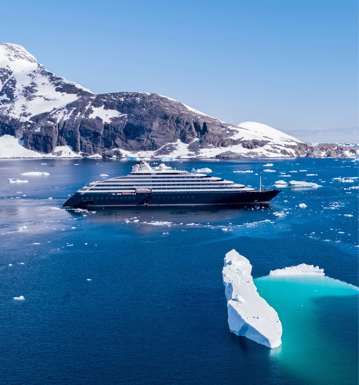 Scenic Eclipse Star-Ship sailing through the Antarctic waters surrounded by iceburgs.