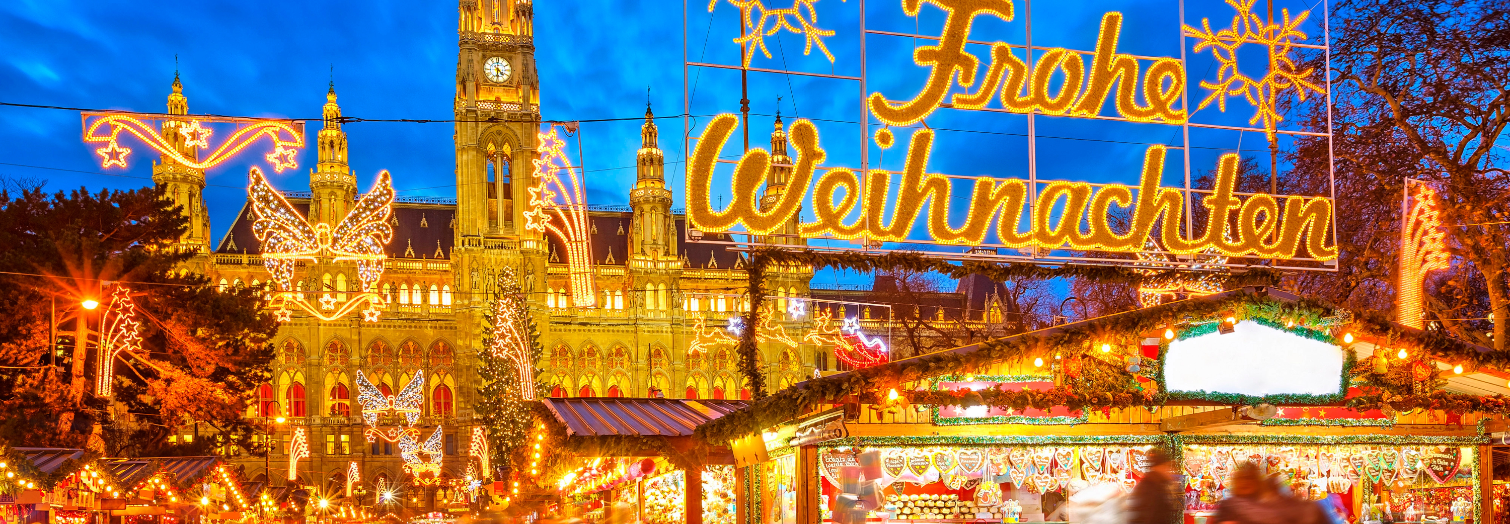 Vienna Christmas Markets at night lit up with Christmas lights