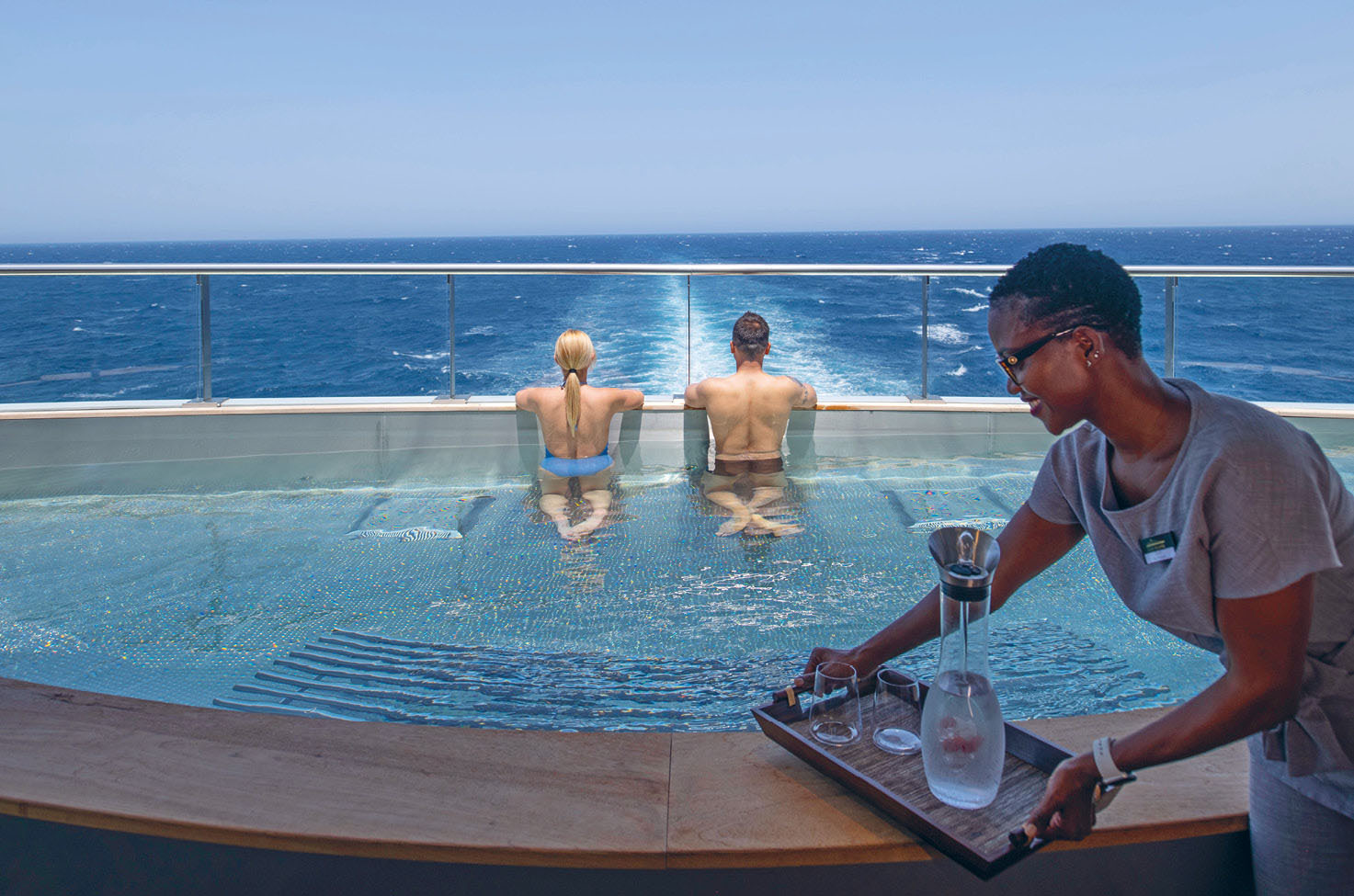 Two guests overlooking the sea from Scenic Eclipse's spa