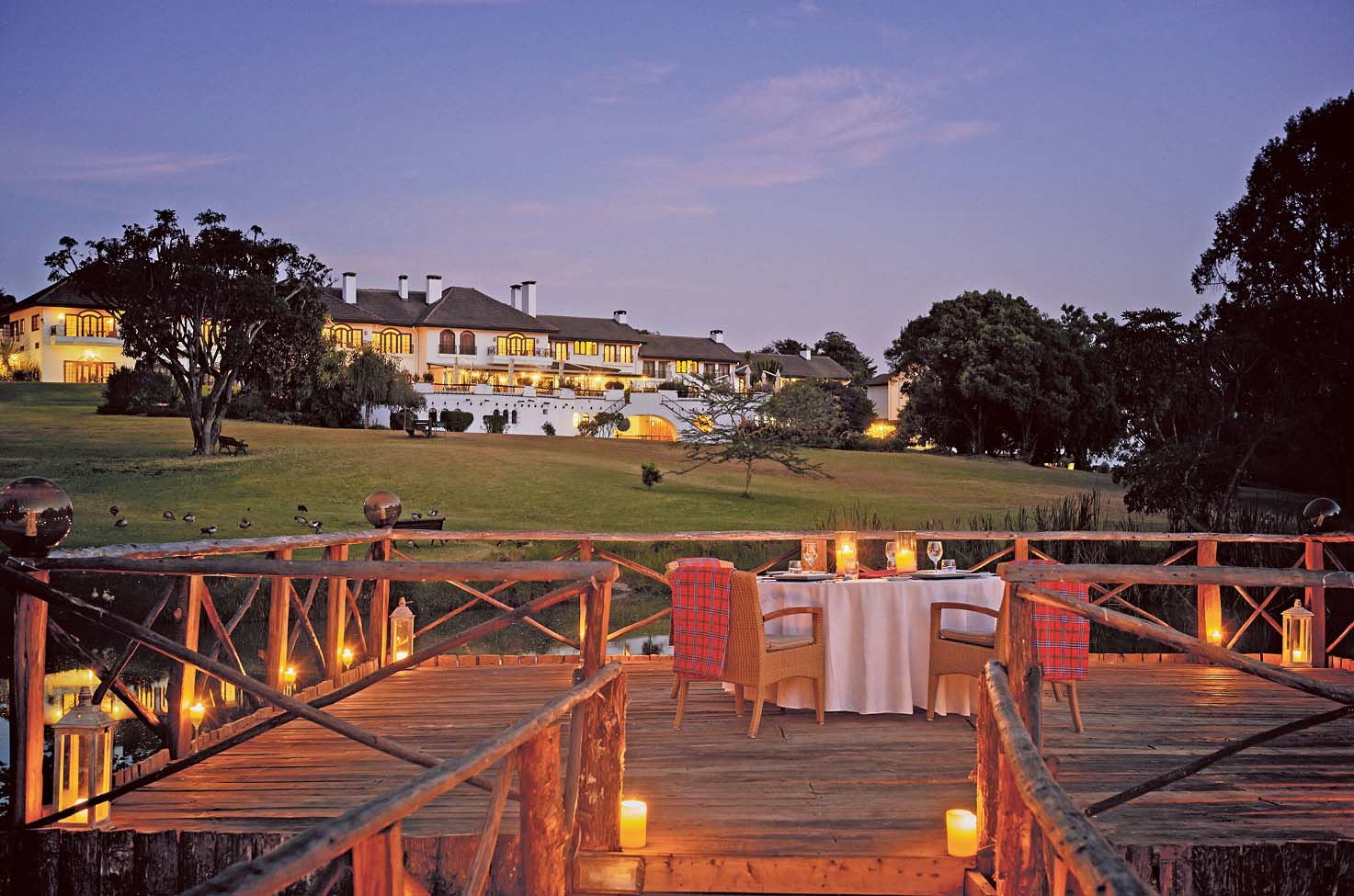 Outdoor dining at Fairmont Mount Kenya Safari Club, a Scenic Special Stay. 
