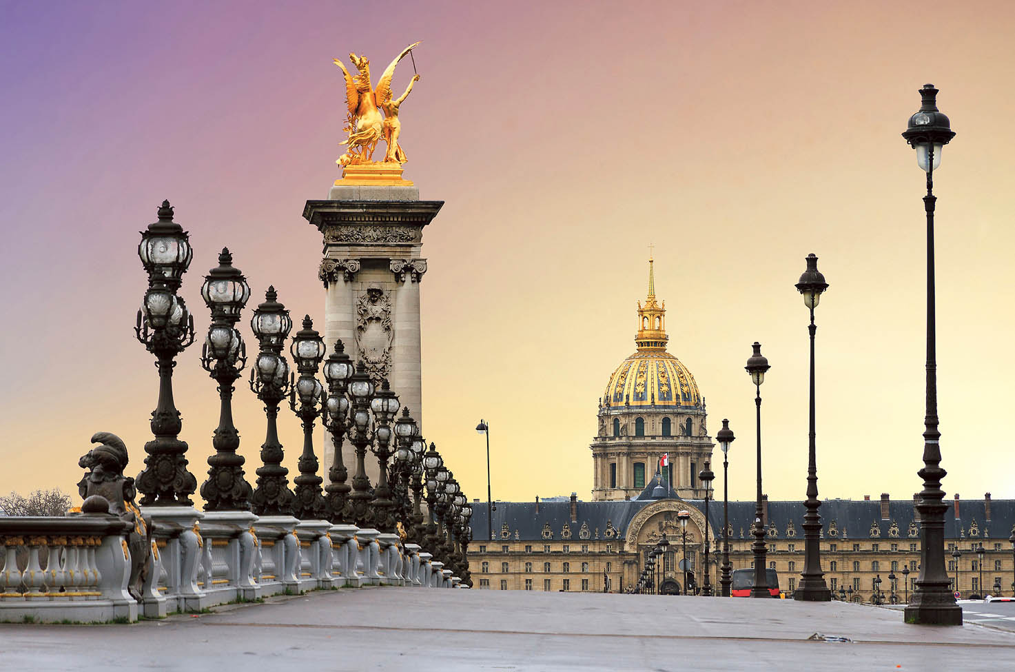 Pont Alexandre 3rd with rows of ornate black lampposts and a golden statue